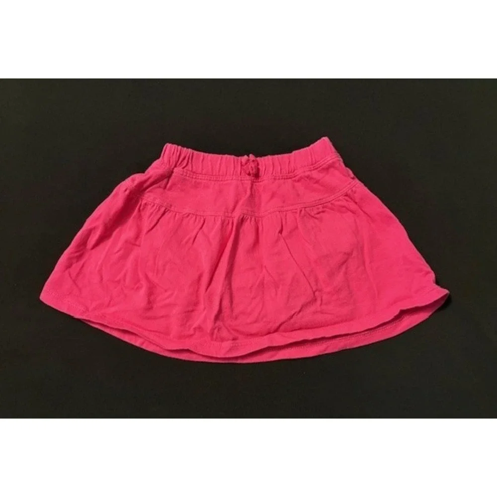 Childrens Place bright pink skirt with attached bloomers, size 12 months